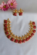 Kundan-Style Necklace Set with Ruby Accents