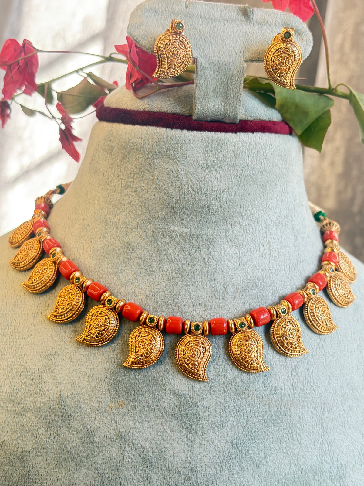 Antique mango with coral beads